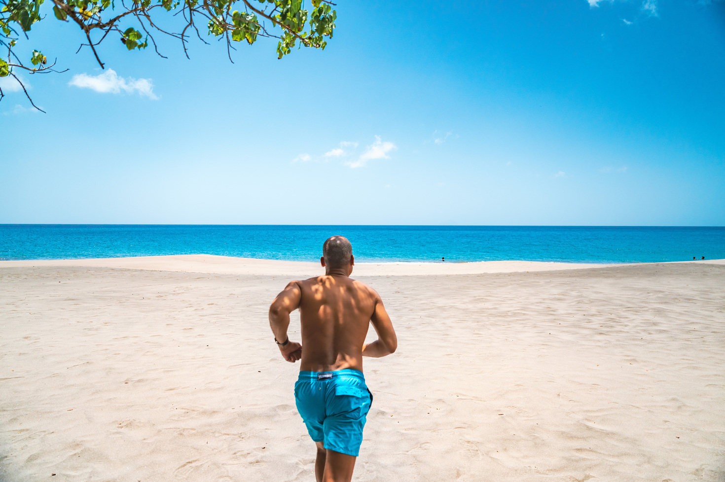 Male running at Woodlands Beach